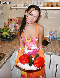 Sexy teen plays with food and cock in the kitchen